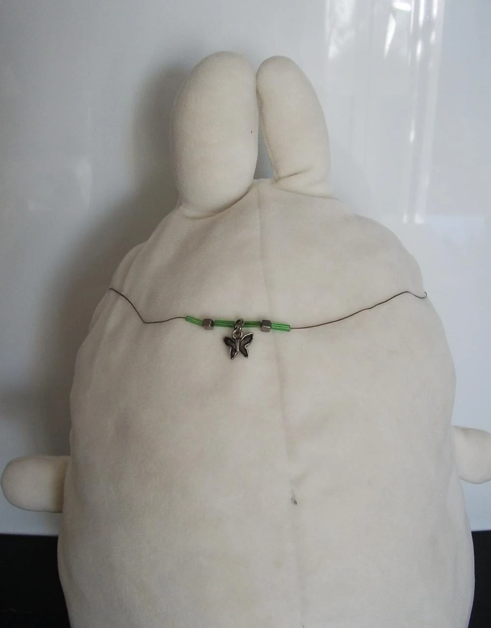 Collier papillon vert